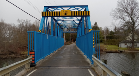 Entrance to a blue bridge